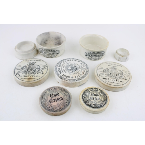 279 - A collection of antique pot lids to include 'Burgess's Anchovy Paste', 'Home Made Potted Meats' and ... 