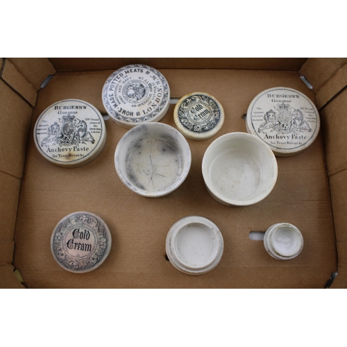 279 - A collection of antique pot lids to include 'Burgess's Anchovy Paste', 'Home Made Potted Meats' and ... 