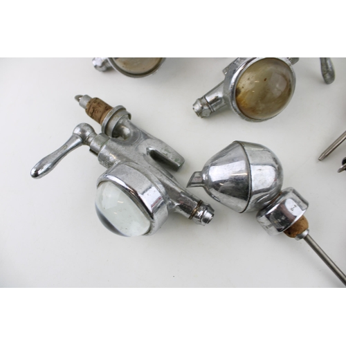 283 - A collection of vintage optics with bullseye lenses and pourers to include 'Optic Pearl' by CASKELL ... 