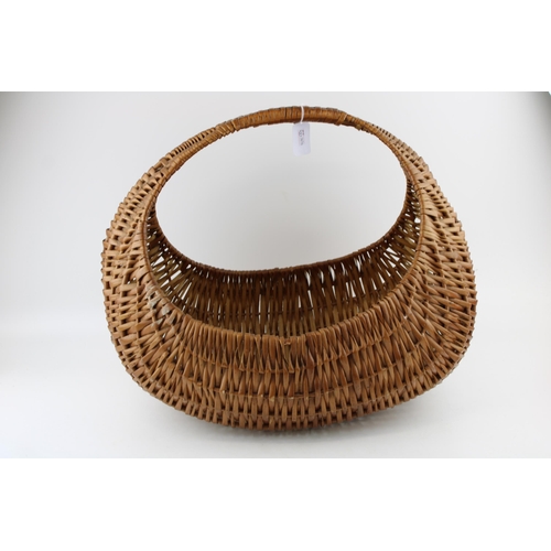 285 - A vintage 'Half Moon / Gondola' wicker basket. Height 38cm.