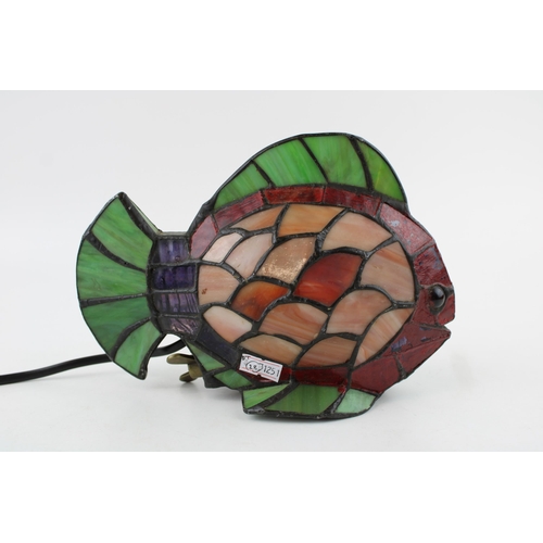 286 - A Tiffany style lamp in the form of a fish. Height 15cm, width 21cm.