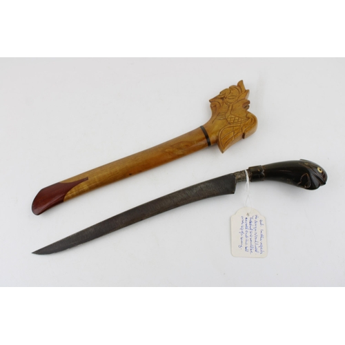 296 - A mid c20th century with  Malayan Kris dagger buffalo horn handle and wooden scabbard