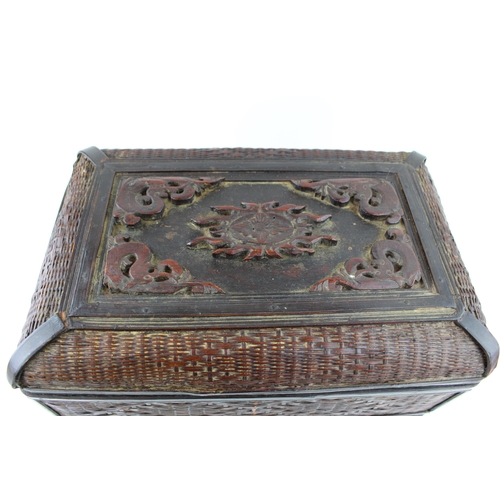 299 - An oriental lacquered woven box with two stacking commitments and lid. (Qty)