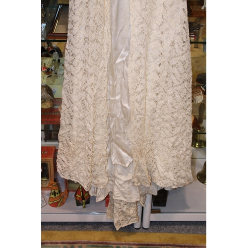 301 - A 1930s vintage silk & lace wedding dress with photograph of wedding dated 1938, a christening dress... 