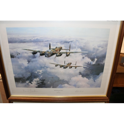 315 - A pair of Robert Taylor prints of planes to include 'Wellington' and 'The Lancaster', framed and gla... 