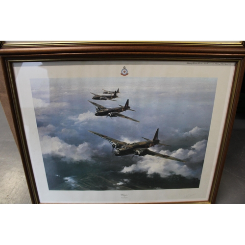 315 - A pair of Robert Taylor prints of planes to include 'Wellington' and 'The Lancaster', framed and gla... 