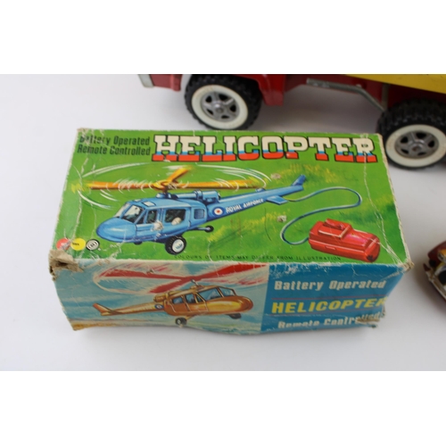 319 - A Tonka tipper truck with a boxed model helicopter c1970s and a Corgi Comics Noddy's Car (3).