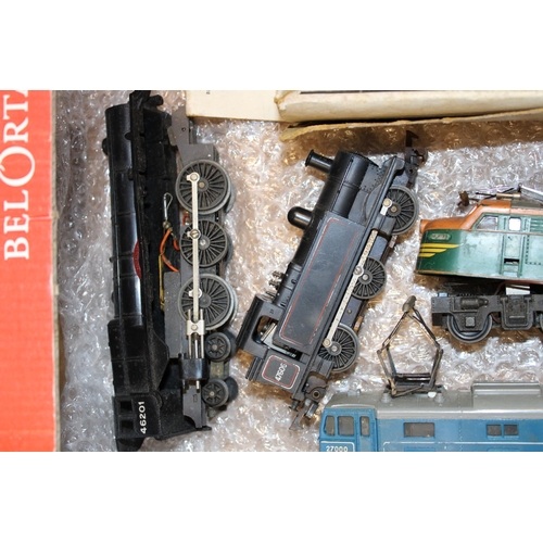 334 - A collection of vintage model railway items to include four locos and a model building kit. a/f. (5)