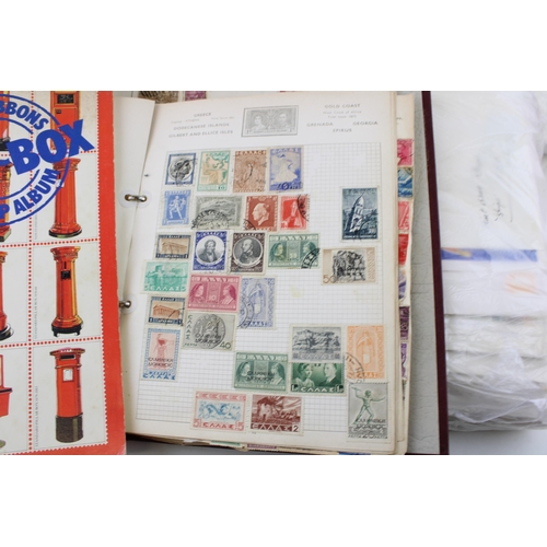 344 - A collection of stamps, stamp albums, first day covers & loose envelopes