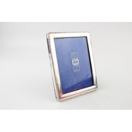 361 - A sterling silver photo frame hallmarked Birmingham 1986, rectangular 13cm x 10cm.