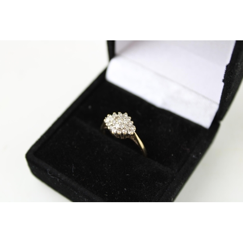 373 - 9ct gold lady's cluster ring, set diamonds, 1.7g, size H/I.