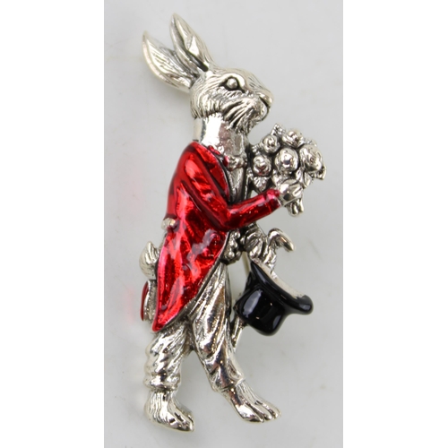 382 - Contemporary sterling silver brooch of a magic rabbit with a top hat, red enamel decoration.