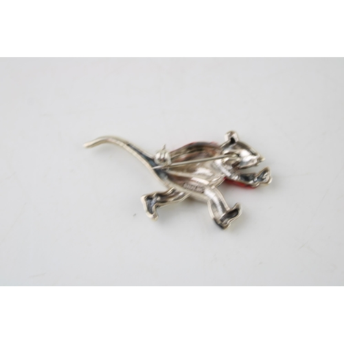 384 - Contemporary sterling silver brooch of a running mouse, red enamel jacket.