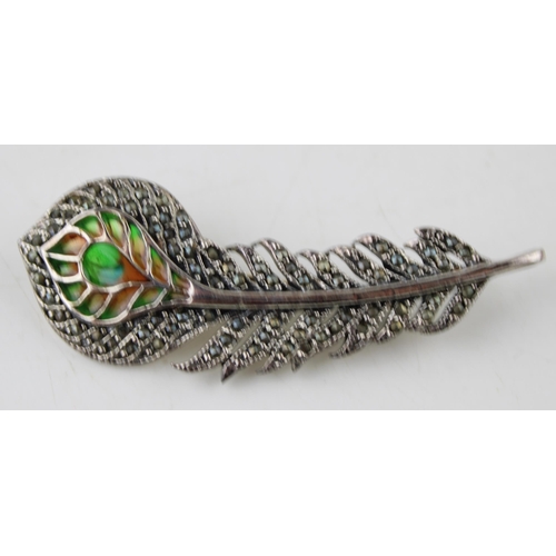 386 - Contemporary sterling silver brooch in the form of a peacock feather.