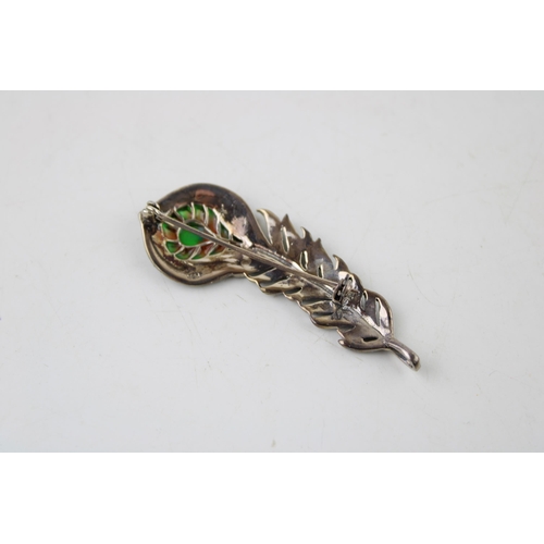 386 - Contemporary sterling silver brooch in the form of a peacock feather.