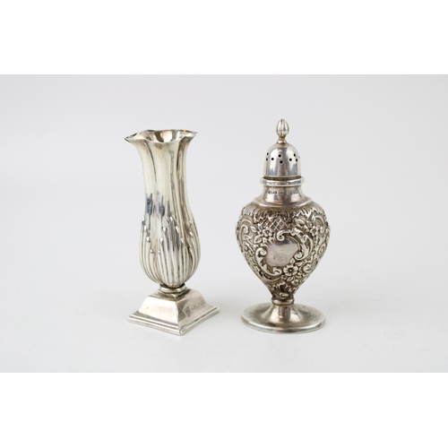 390 - Silver loaded vase, ornate form, Chester 1895, with a Silver pepperette, Birm 1899, total weight 90.... 