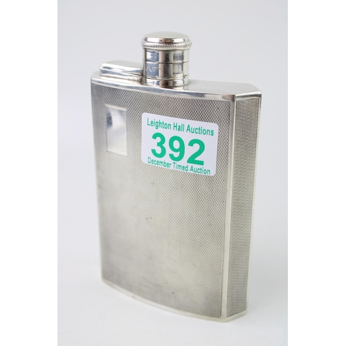 392 - Silver plated Art Deco hipflask, engine turned decoration, vacant cartouche, 14cm tall.