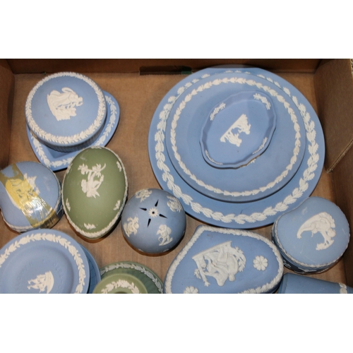 4 - A collection of Wedgwood Jasperware items to include vases, candle sticks, lidded pots, trinket tray... 