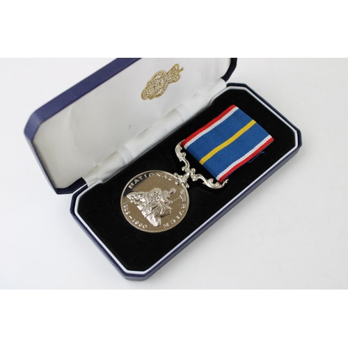 401 - Silver National Service Medal, D C Raynor, Scots Guards, boxed.