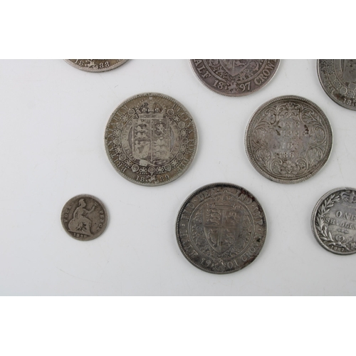 408 - A collection of Victorian silver coins to include an 1845 Crown, half crowns, a maundy four pence pi... 