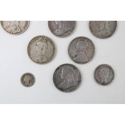 408 - A collection of Victorian silver coins to include an 1845 Crown, half crowns, a maundy four pence pi... 