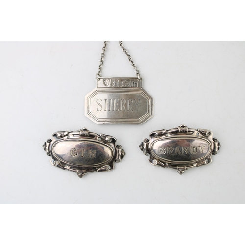 409 - A trio of silver hallmarked spirit labels to include Sherry, Brandy and Gin (3), 36.1g.