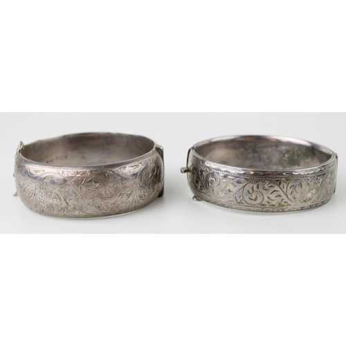 416 - Two silver bracelets, engraved decoration to the front, 86g (2).