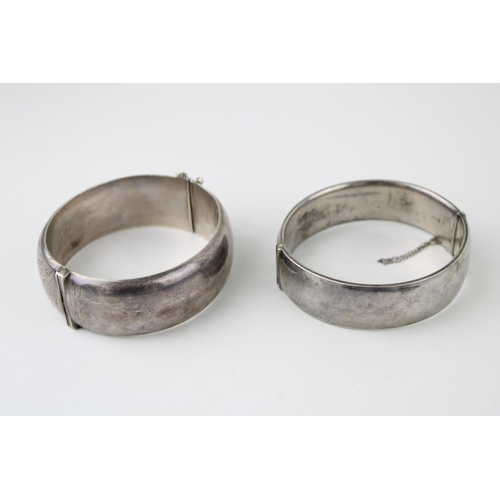 416 - Two silver bracelets, engraved decoration to the front, 86g (2).