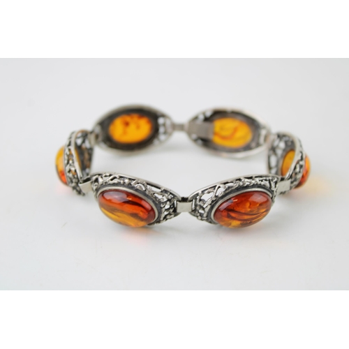 421 - Silver and faux amber bracelet, 26.3g, 18cm long, working clasp.