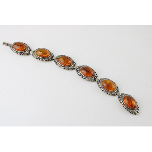 421 - Silver and faux amber bracelet, 26.3g, 18cm long, working clasp.