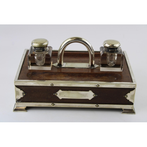 424 - Edwardian ink stand with drawer, silver plated mounts and inkwells, 30cm wide.