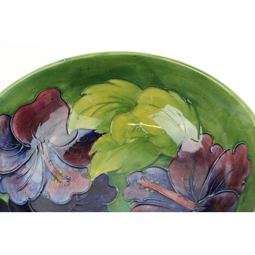 62 - A Moorcroft Hibiscus bowl with a rectangular dish, 21cm diameter (2 - both af).