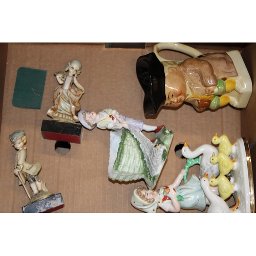 87 - Mixed pottery to include a Gerald Porzellan figure of a goose girl, Toby jugs, resin figures and oth... 