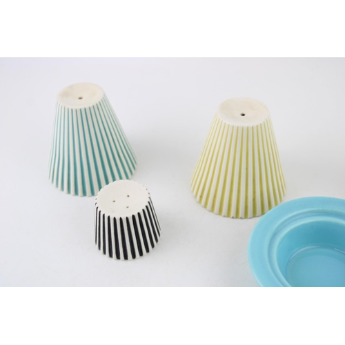 110C - A collection of Hornsea 'Crafty' cruets in various colourways, blue has the original dish present. H... 