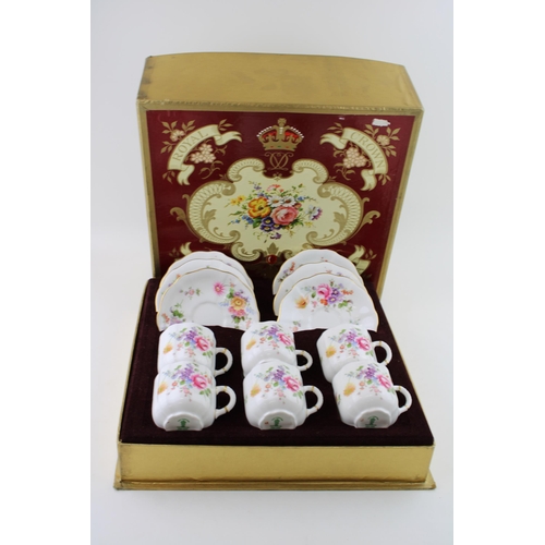 117 - Boxed Royal Crown Derby 'Derby Posies' to include 6 cups and 6 saucers (12).