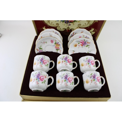 117 - Boxed Royal Crown Derby 'Derby Posies' to include 6 cups and 6 saucers (12).