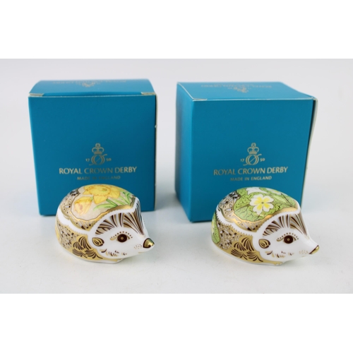 125 - Two Royal Crown Derby paperweights, Daffodil Hedgehog and Primrose Hedgehog, gold stoppers and grey ... 