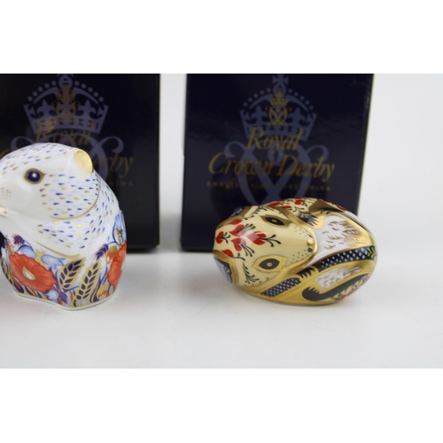 136 - Three Royal Crown Derby paperweights, Mouse, gold stopper and red Royal Crown Derby stamp on the bas... 