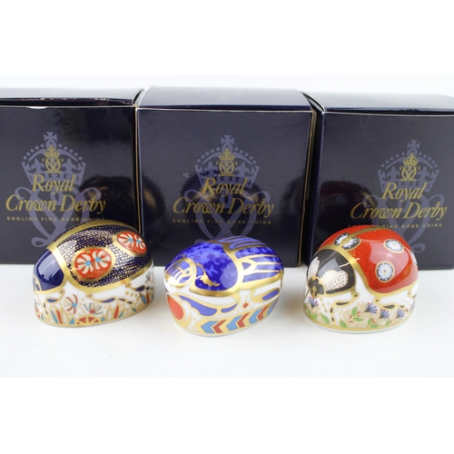 137 - Royal Crown Derby Paperweight, Blue Ladybird with four spots, gold stopper and red Royal Crown Derby... 