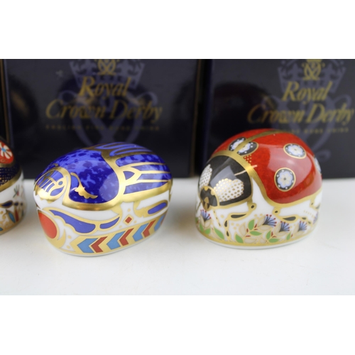 137 - Royal Crown Derby Paperweight, Blue Ladybird with four spots, gold stopper and red Royal Crown Derby... 