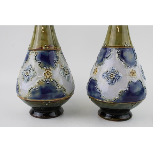 147 - A pair of Royal Doulton stoneware vases, blue background, green neck, incised '8368', 27.5cm tall (2... 