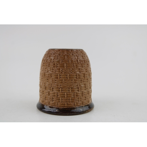 160 - Doulton Lambeth novelty match holder and striker, the stoneware vessel in the form of a beehive or s... 