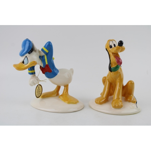 165 - Two Royal Doulton ceramic Walt Disney figures, 'Goofy' and 'Donald Duck'. Height 13.5cm (2), seconds... 