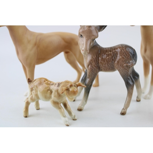 22 - Beswick to include two Jovial Roger greyhounds, a comical donkey foal, a goat and a pheasant (5).