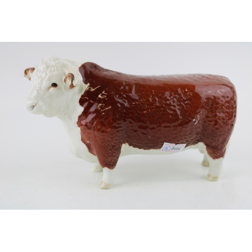 29 - A Beswick Hereford Bull 'Champion of Champions'. Height 12cm.