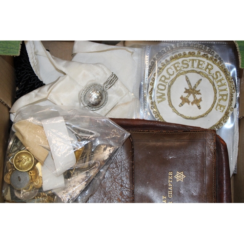 326 - A collection of Masonic items to include leather satchel, sash, buttons, badges and similar items. (... 