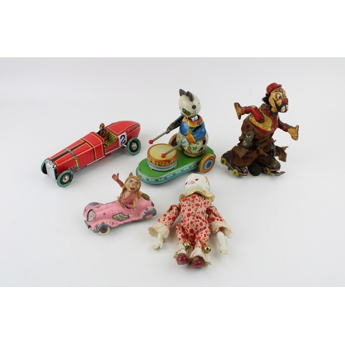 442 - A collection of vintage clockwork tin toys to include Hobo clown (Japan) , Celuloid tumbling toy (Ja... 