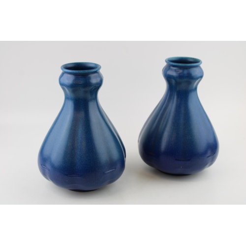 47 - A large pair of Royal Lancastrian vases, mottled blue decoration, shaped, 25.5cm tall (2).