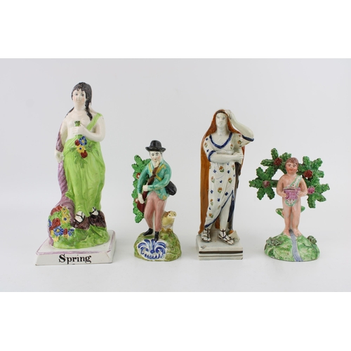 50 - Four early 19th century Staffordshire figures to include a bocage figure of a nude boy 'Salt' to ver... 