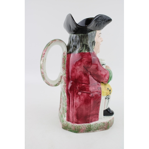 51 - Davenport Toby jug, decorated in Portobello type colours with a red jacket over yellow breeches, the... 